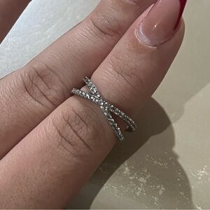 Elegant Silver Crossover Ring